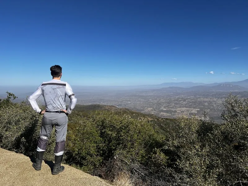 Nils at a California overlook — the calm garage-detective stance that buys good bikes.