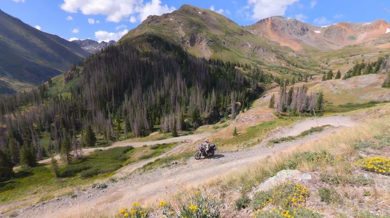 The Aprilia Tuareg 660 on a rocky Colorado alpine switchback high above the treeline