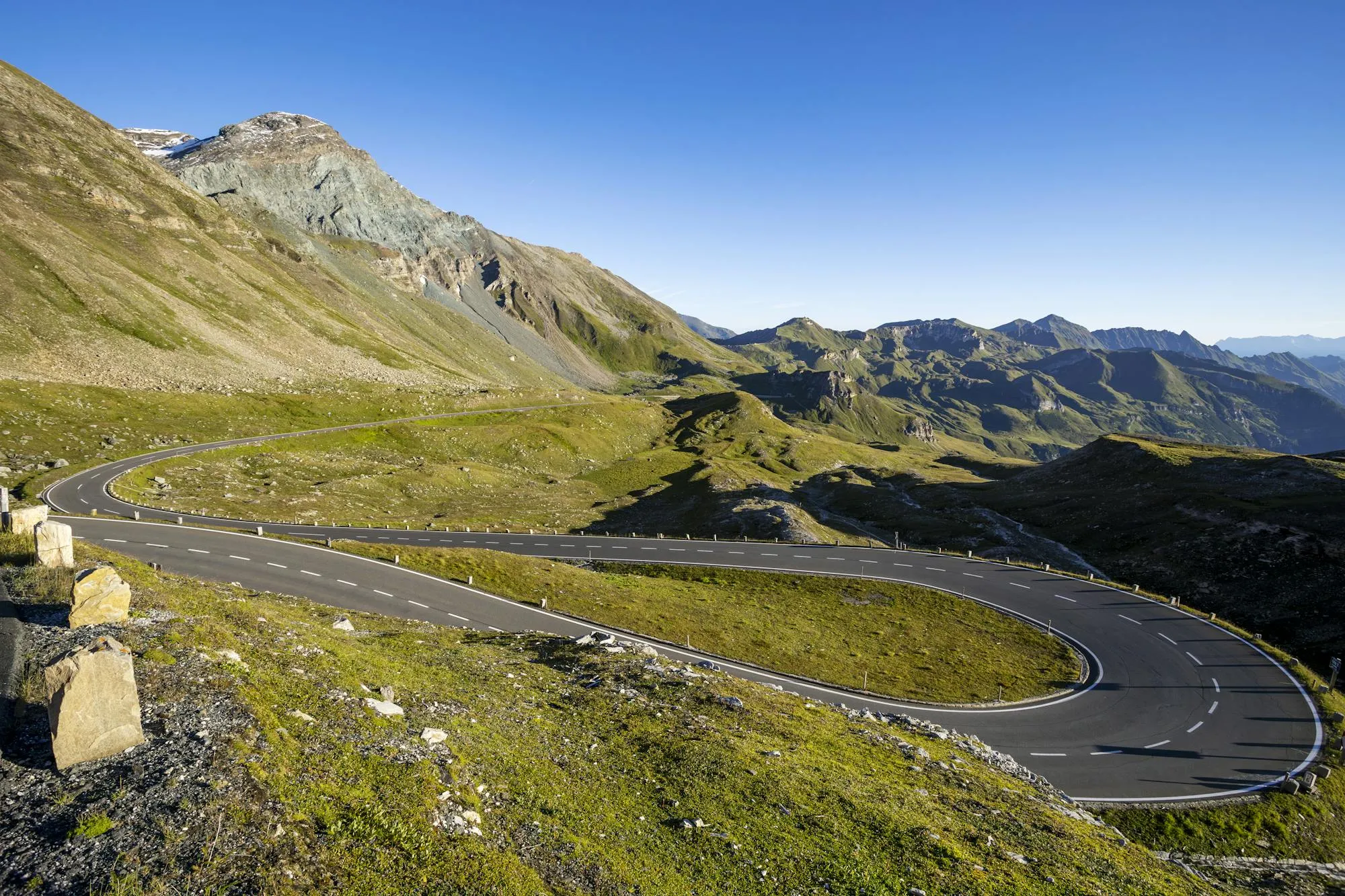 The Beartooth Highway in Wyoming, switchbacks unfolding through alpine landscape — the test bed where hairpin technique either works or it doesn't.