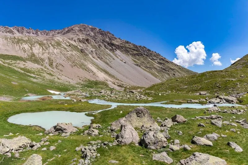 Small alpine lakes and rocky slopes in Mercantour on the French side of the Maritime Alps.
