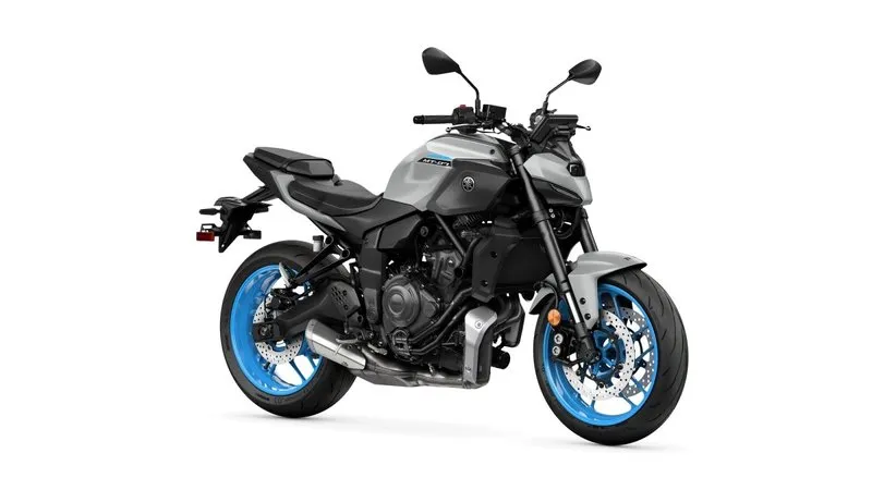 Yamaha MT-07 (RM33 generation, 2025 US press shot, Cyan Storm). The naked-bike silhouette referenced throughout this article: parallel-twin engine fully exposed, no fairing, upright stance, mid-weight chassis.